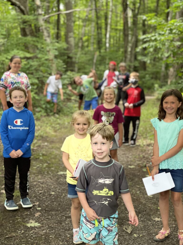 group of children in the woods