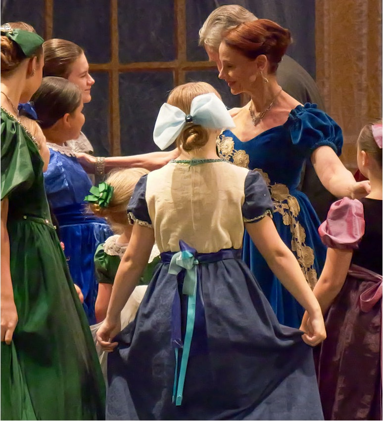 Victoria Rinaldi with party children in The Nutcracker