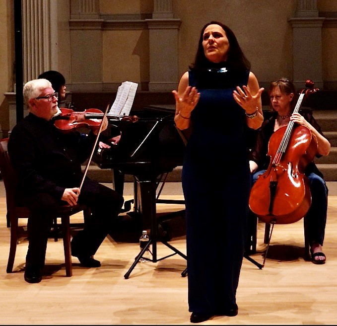 Singer with violinist, cellist, and pianist