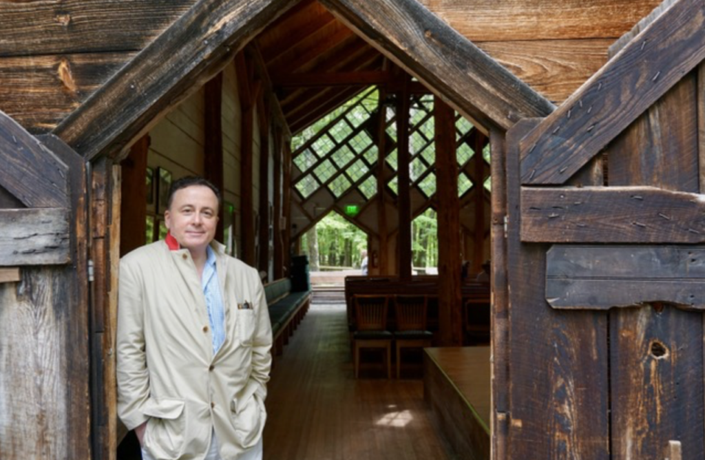 Alexander Platt stands at the entrance to Maverick Concert Hall