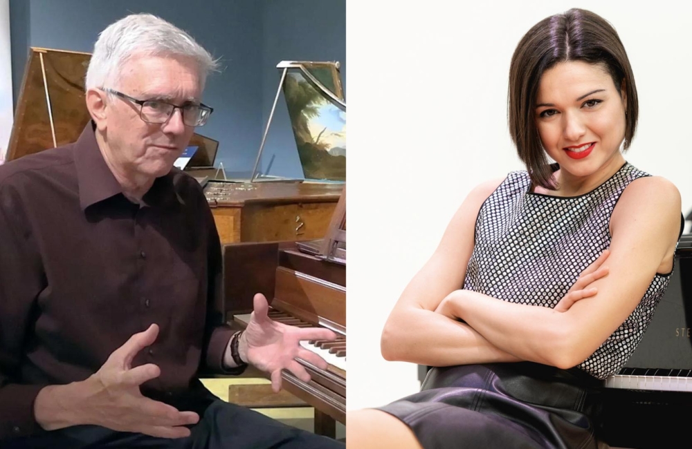 Man speaking in front of piano and woman seated in front of piano