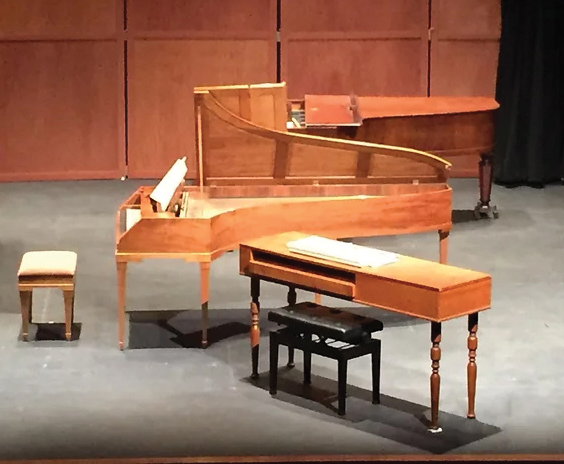 Historic pianos on a stage